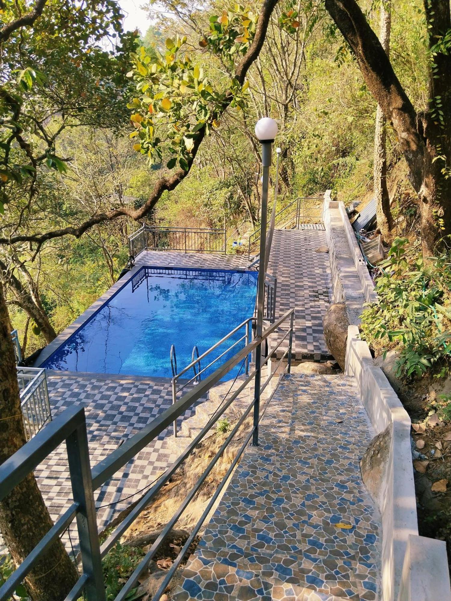 Sunset Valley Kerala Pool Resort - Serene Natural Forest Cottage Stay In Idukki With Sunrise & Sunset Panoramas, Natural Streams & Tranquil Summer Evenings Pirmed ภายนอก รูปภาพ